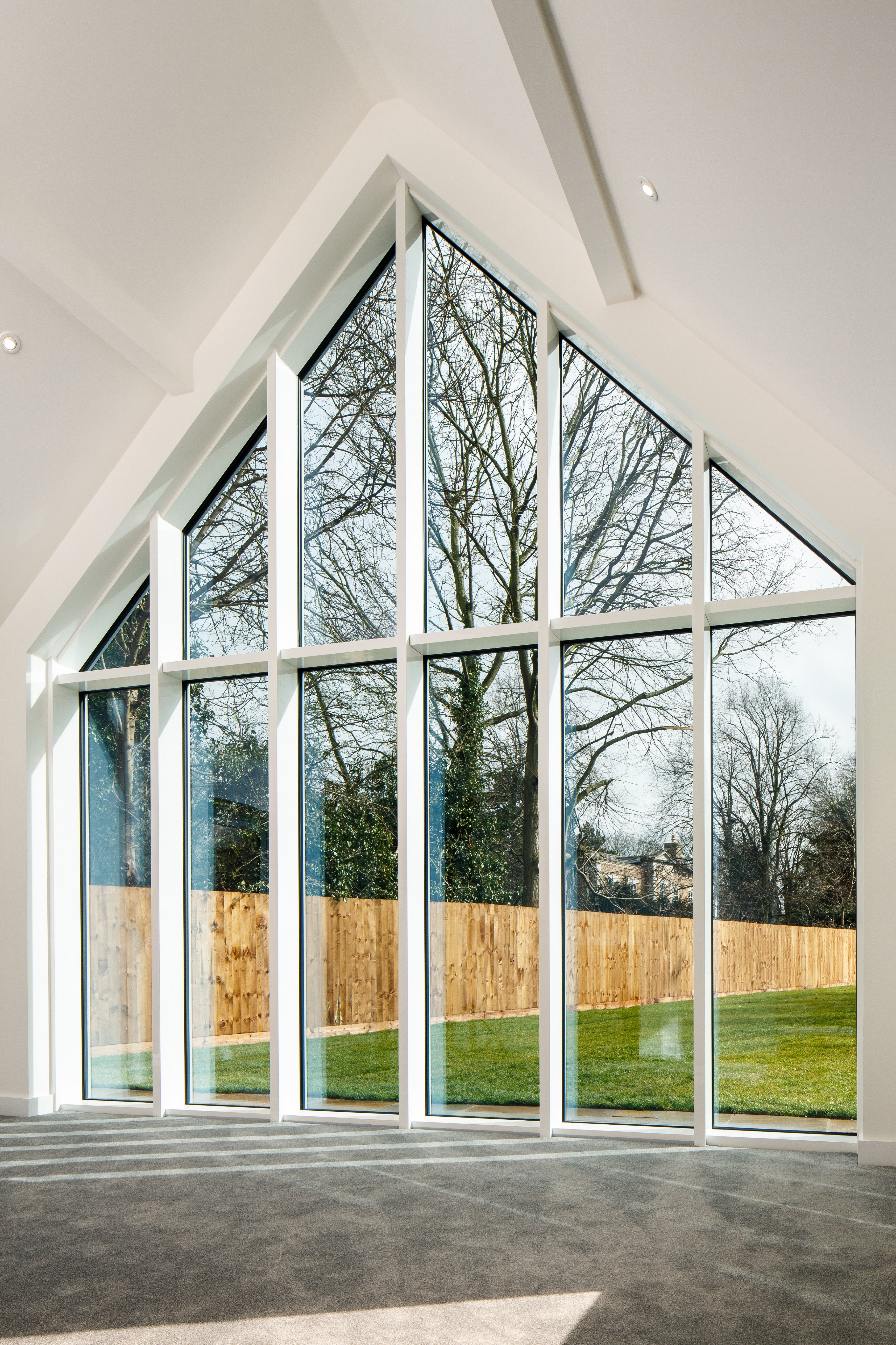 Aluminium feature window, curtain walling system using pilkington active blue glass