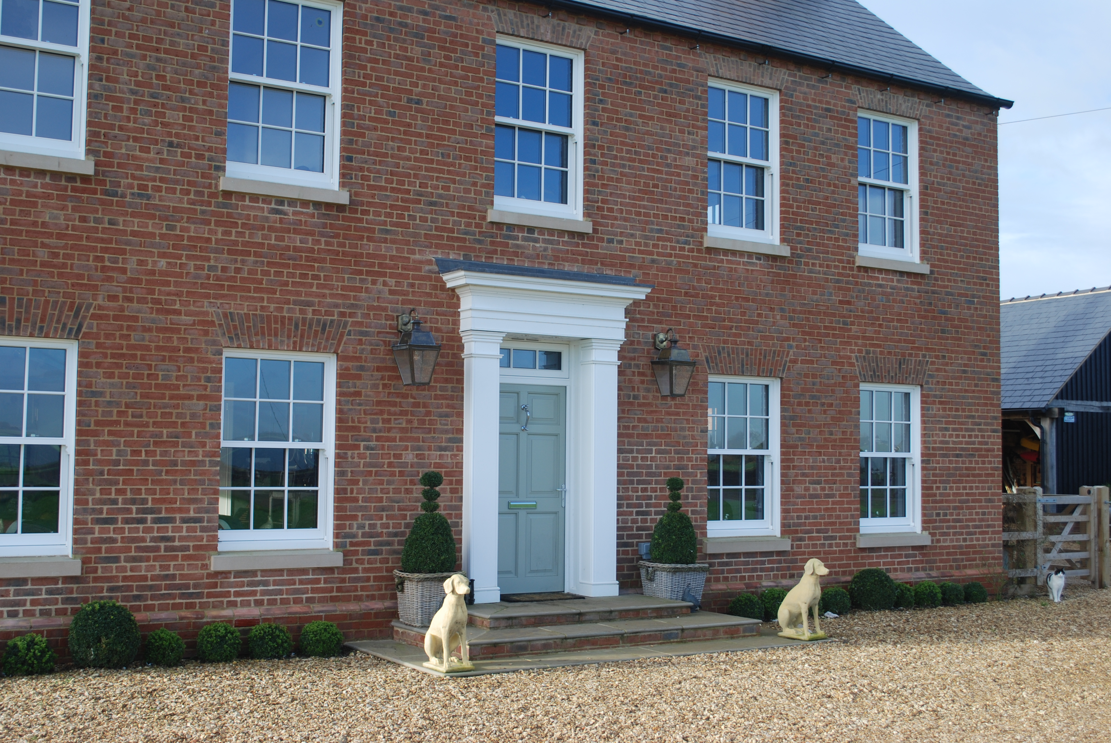 Spiral balances sash box windows in hardwood